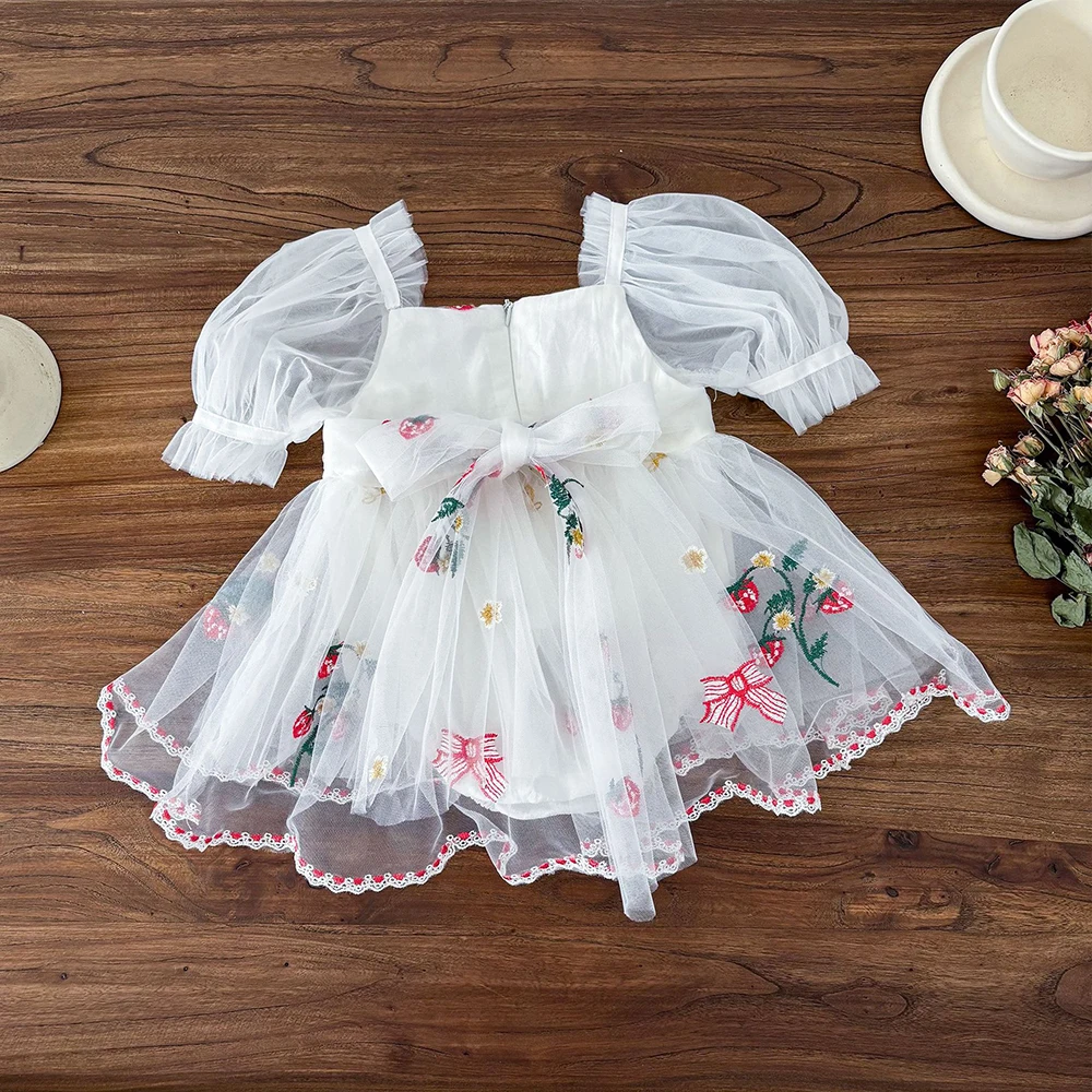 Vestido azul con mangas abullonadas para bebé