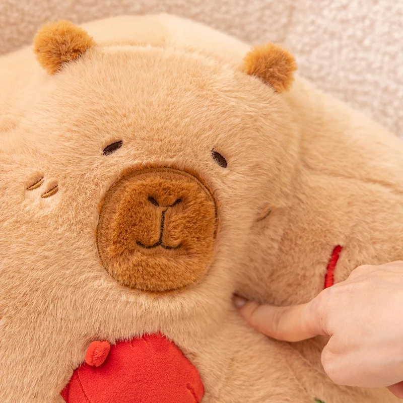 Almohada navideña capibara con relleno pan de jengibre
