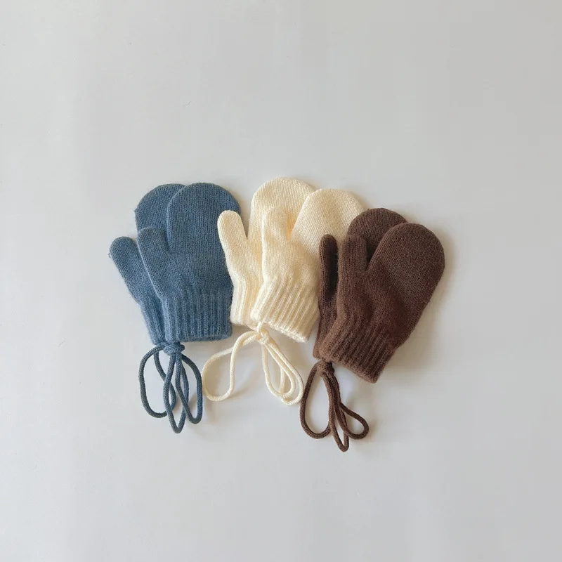Guantes de punto sólido a prueba de frío con cordones
