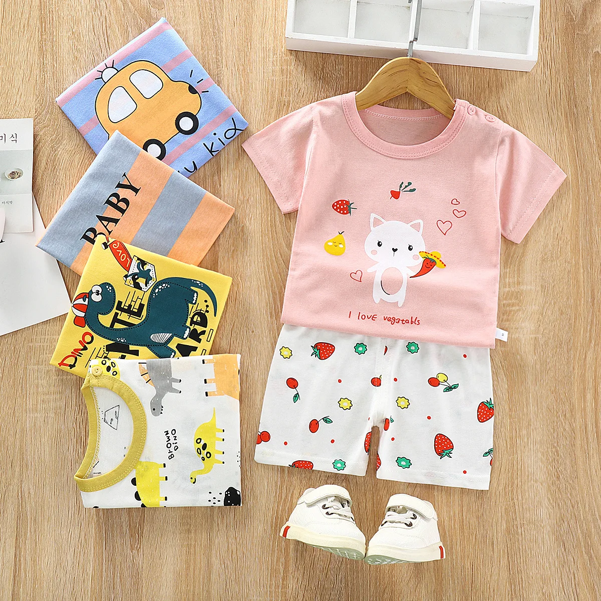 Conjunto unisex de algodón con camiseta manga corta y shorts dibujos - imagen 2