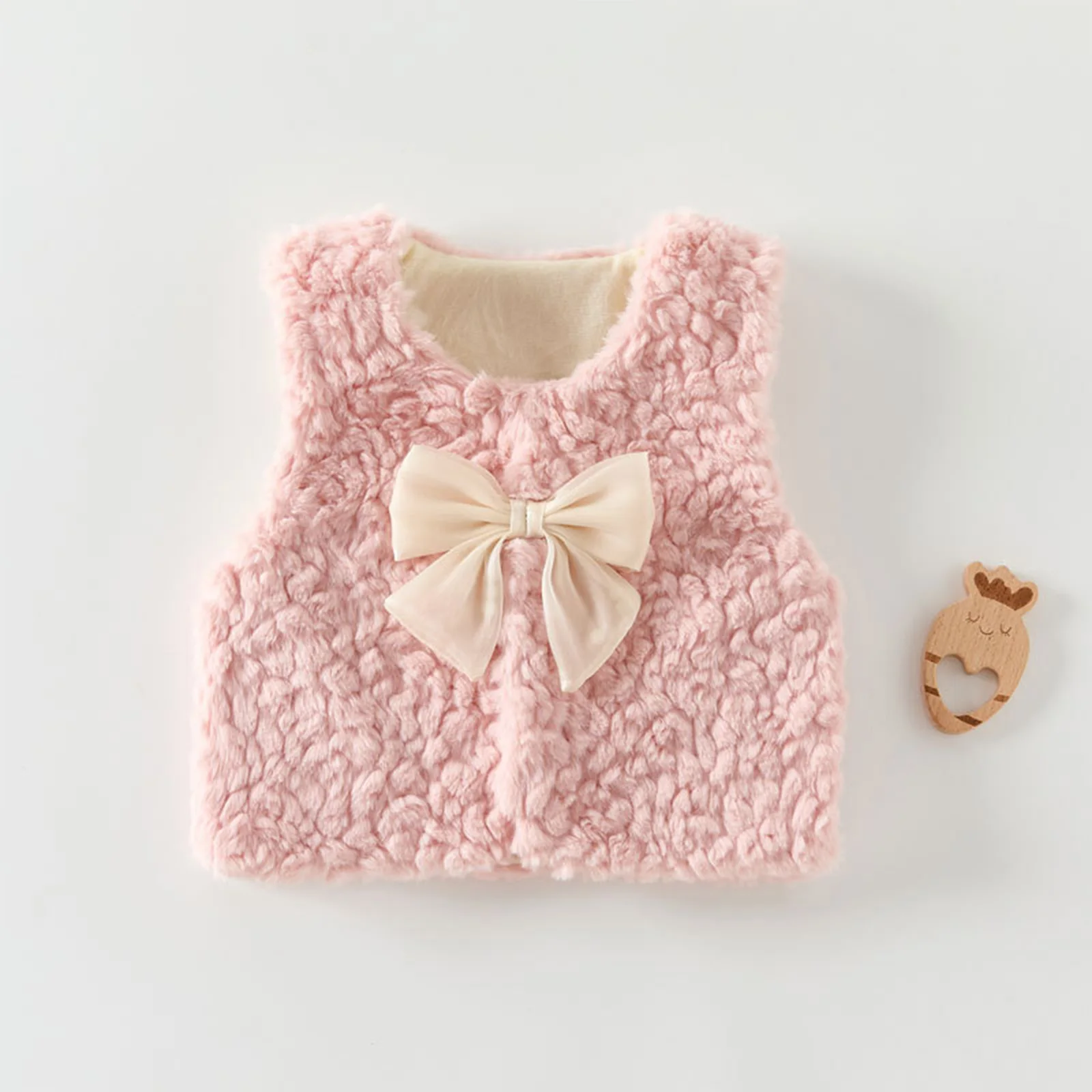 Chaleco en rosa con lazo