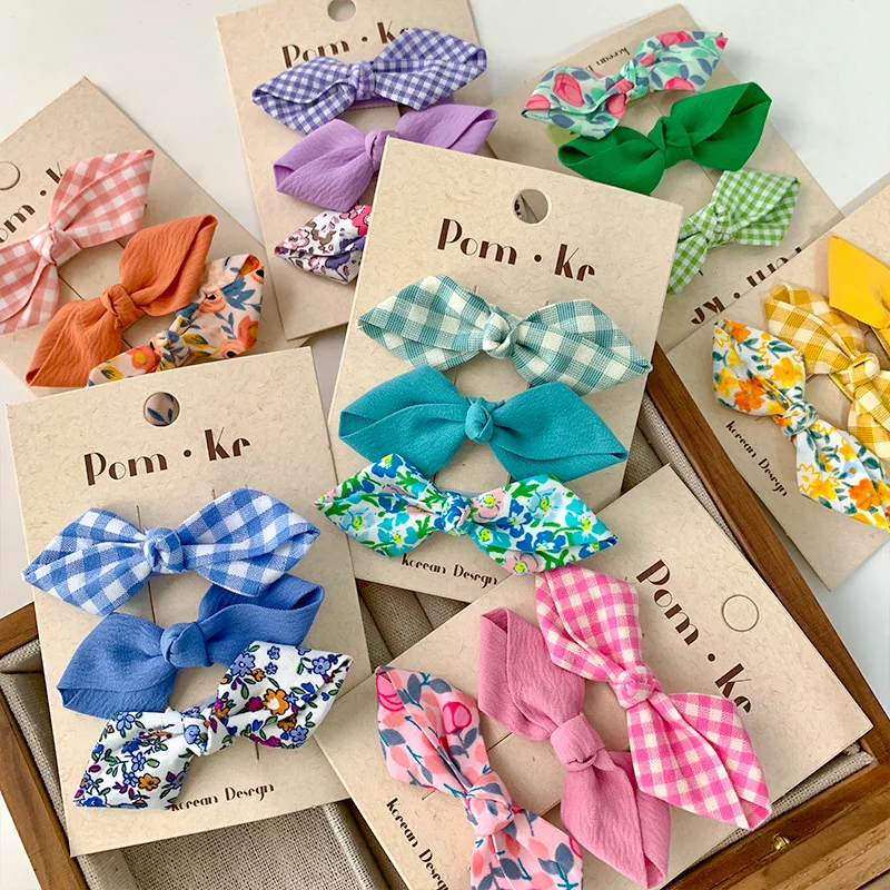 Lote de lazos y pasadores para niñas con estampado floral y a cuadros