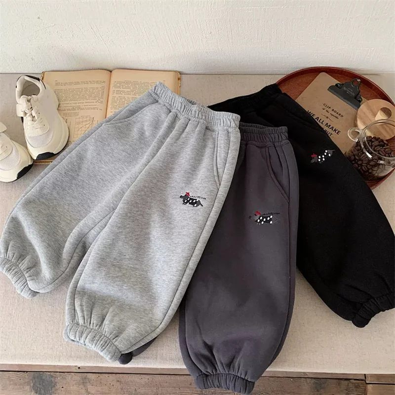 Pantalones gruesos y cálidos con puños, vista lateral