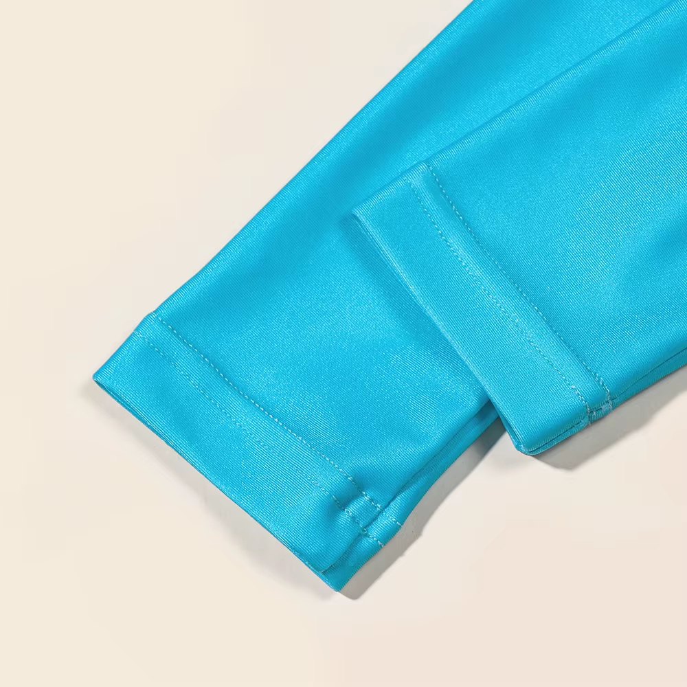 Traje de baño infantil manga larga con volantes y patrón escamas