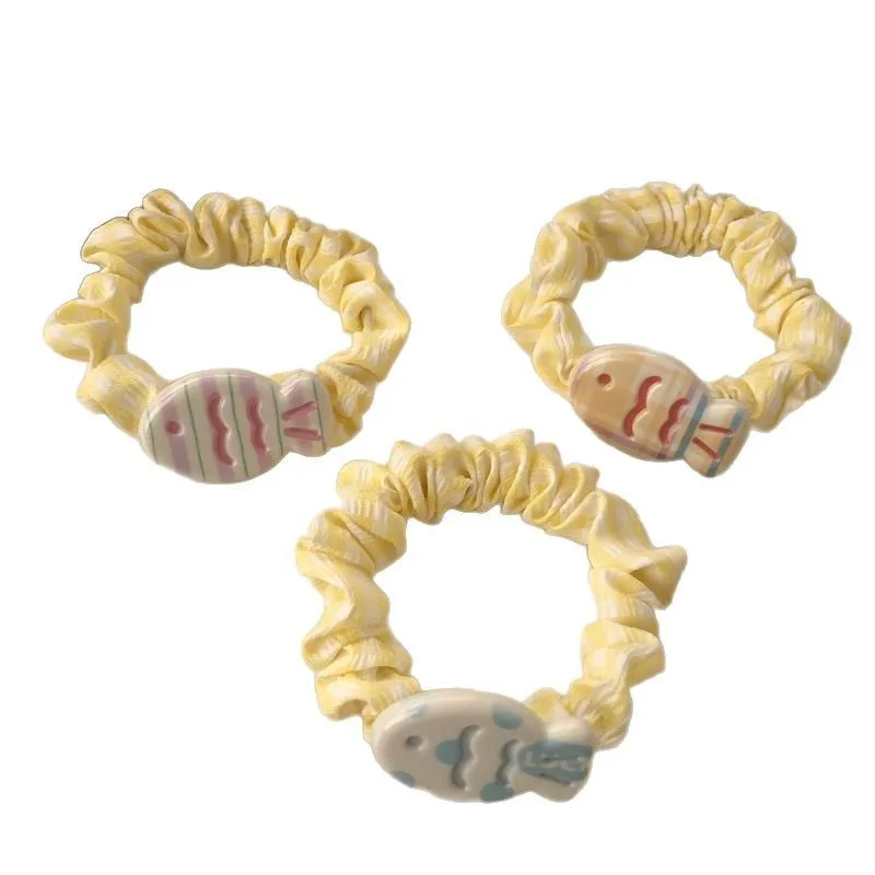 Diadema infantil con estampado de pez y rayas – Color crema - imagen 5