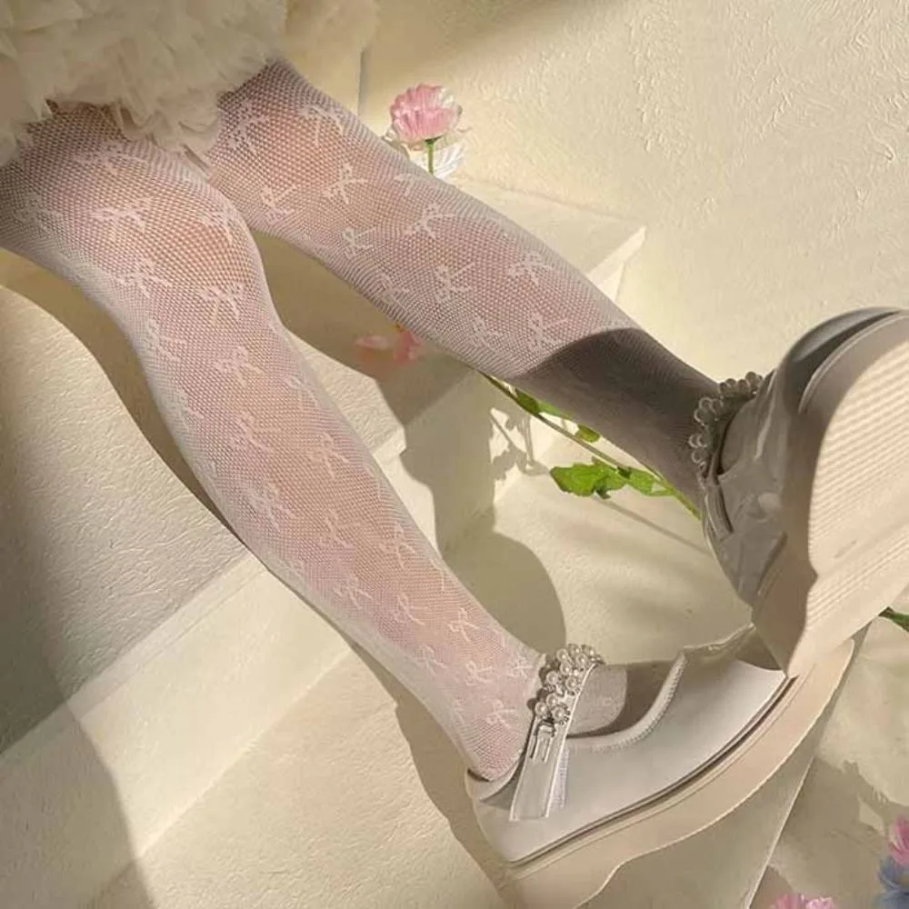 Pantimedias de encaje con lazo detalle