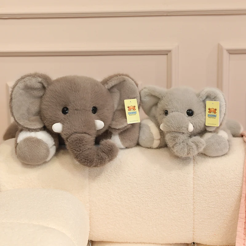 Muñeco de peluche gris marrón