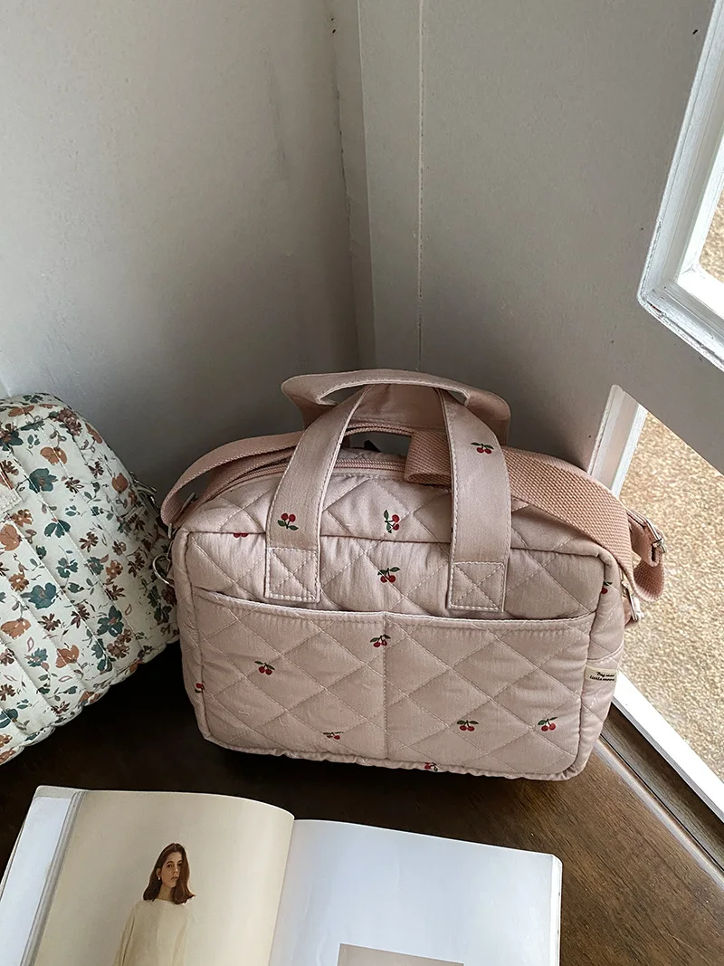 Bolsa de pañales portátil para carro y cochecito con estampado