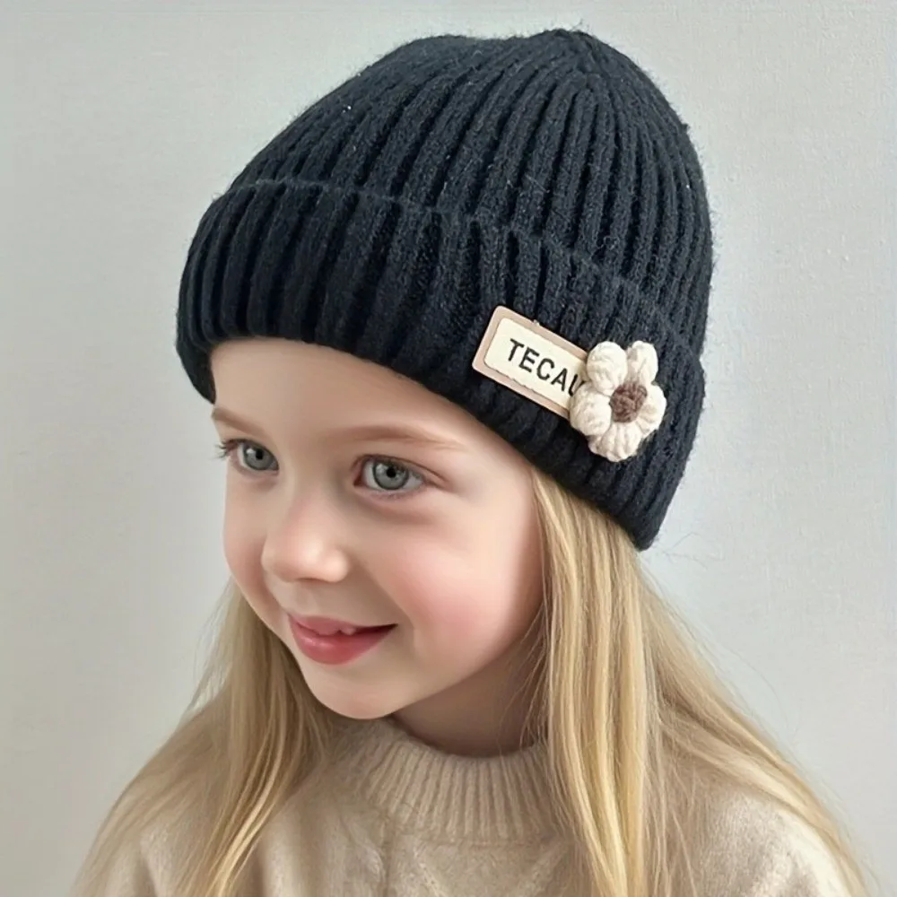 Gorro rosa con flores para bebé