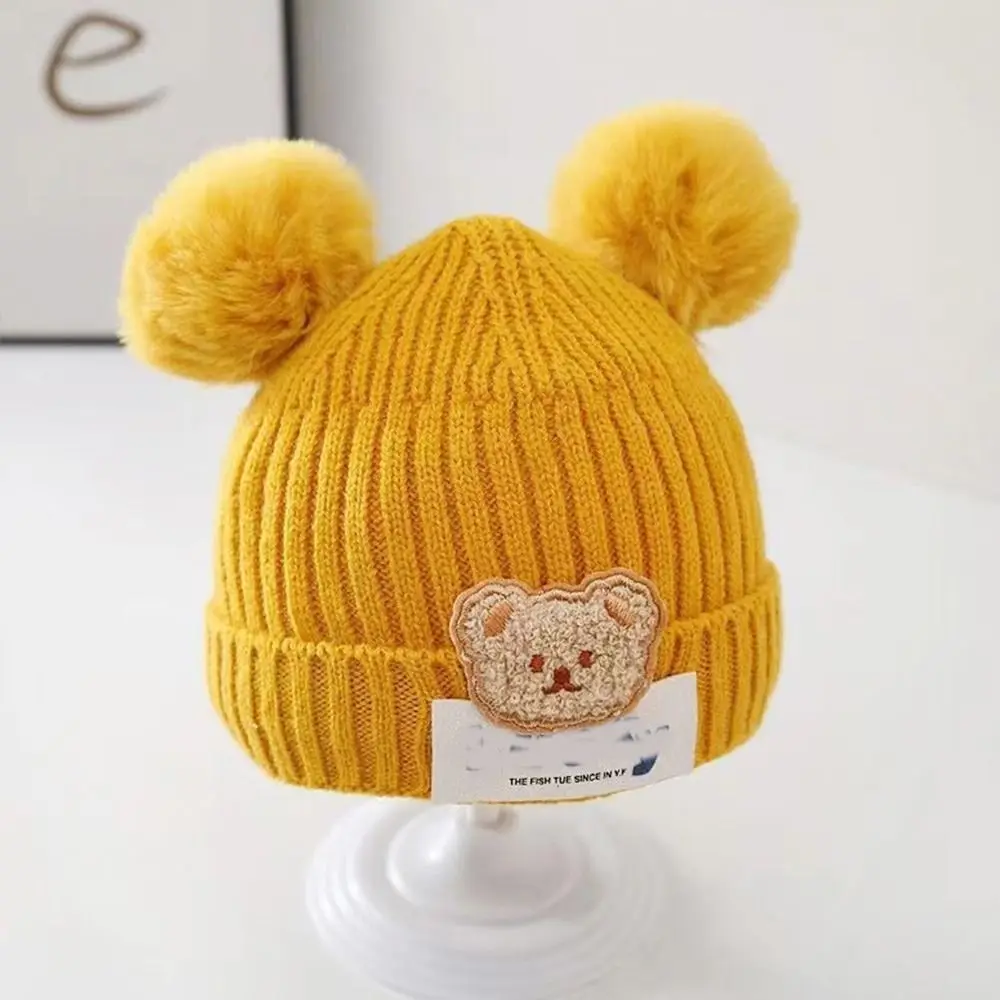 Gorro de invierno infantil con borla de pelo suave