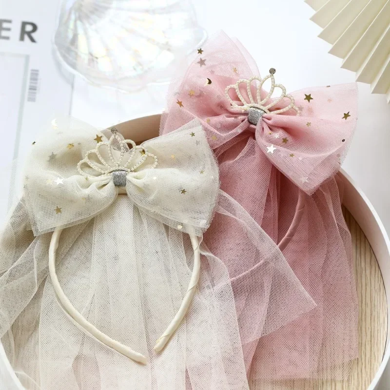 Diadema de princesa con corona y lazo