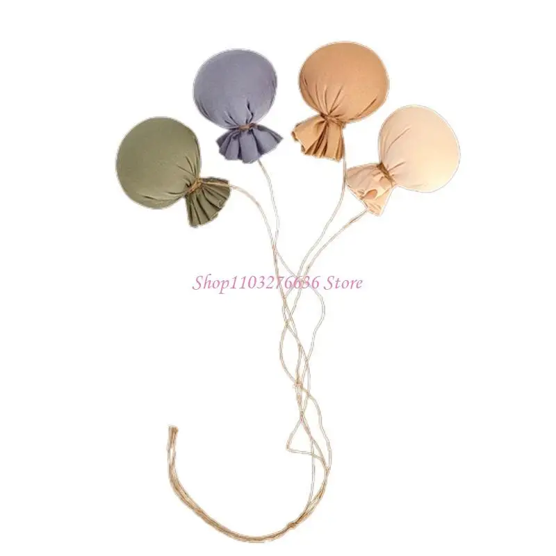 Composición decorativa con globos de tela para newborn