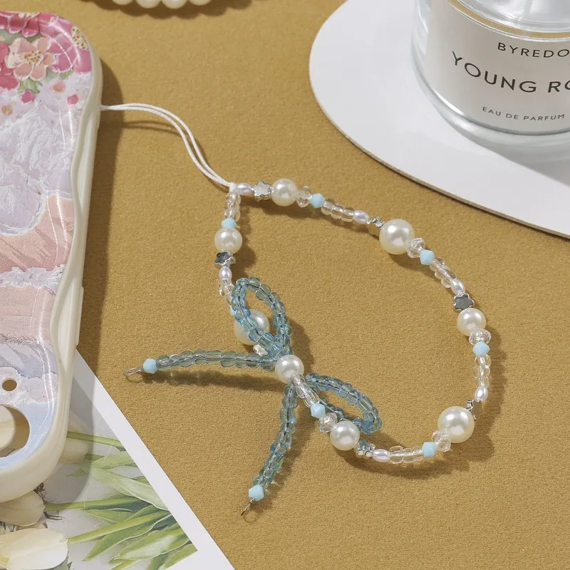 Colgante estrella con perla y lazo para iPhone infantil - imagen 5