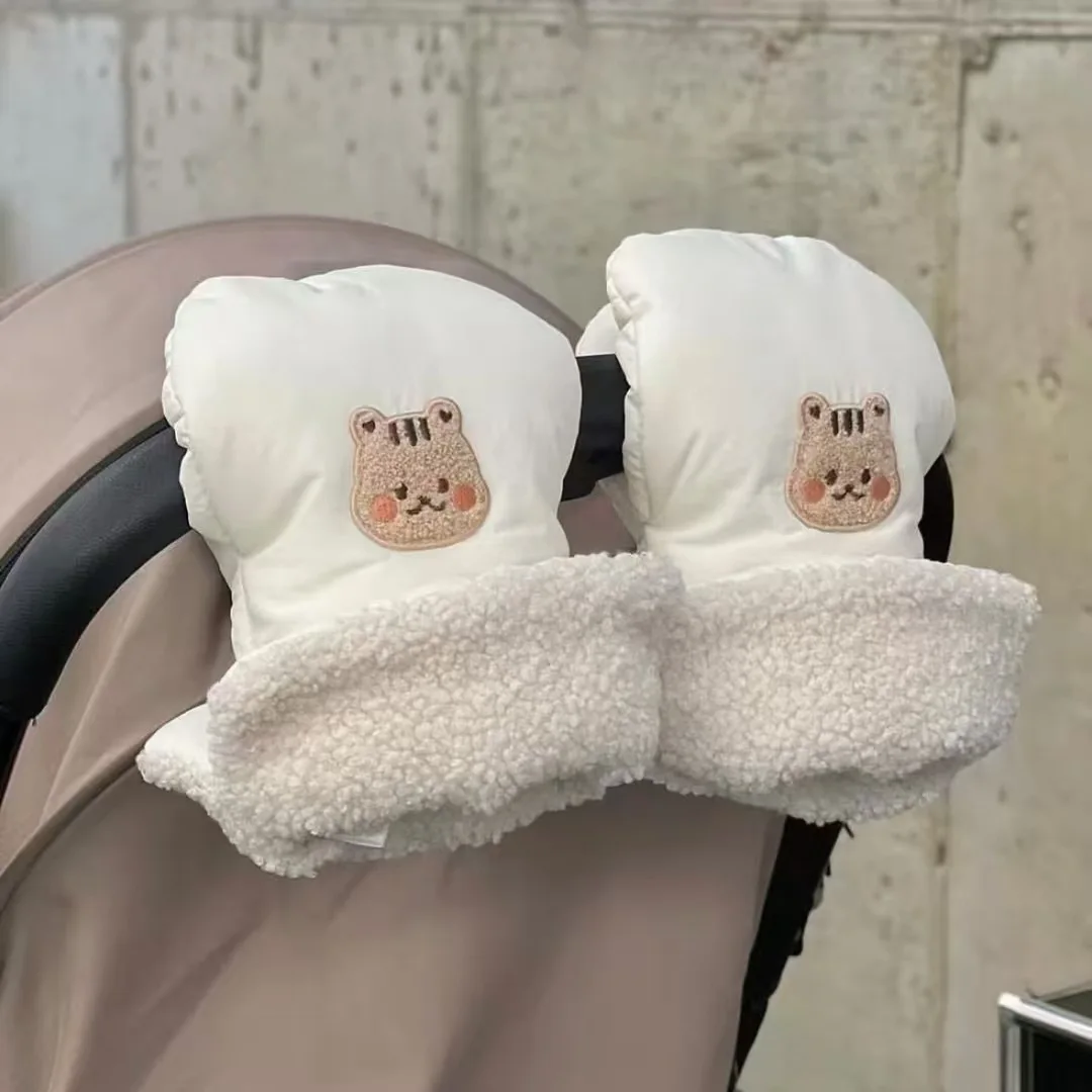 Manoplas con asa para cochecito de padres, vista frontal