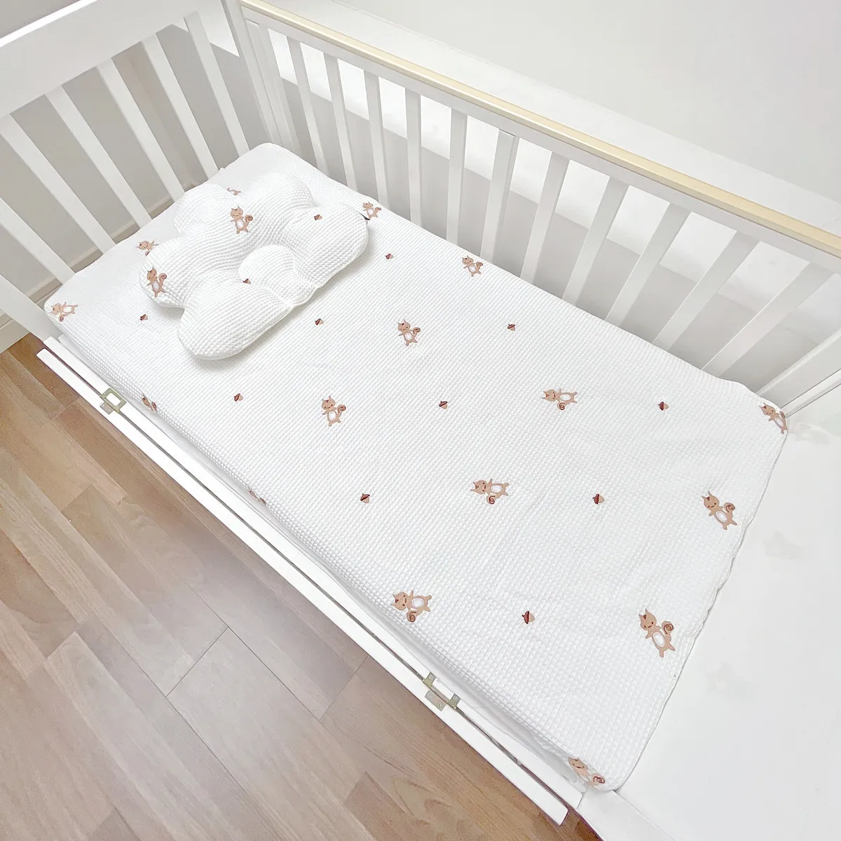 Sábanas ajustadas con gofres blancos para mini cuna