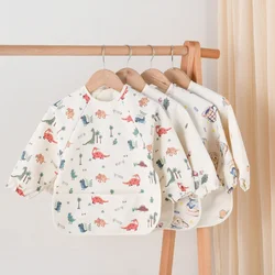 Delantal impermeable para bebé con capucha y funda de comida