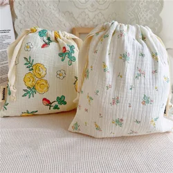 Bolsa porta pañales de algodón natural con cordón arcoíris práctica
