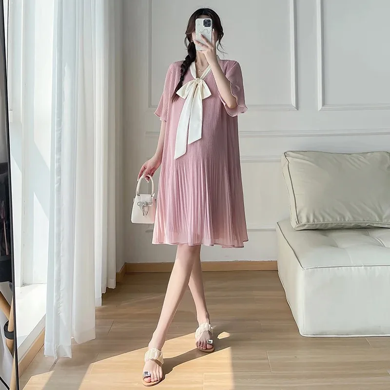 Vestido de maternidad elegante de gasa plisada con lazo y botones