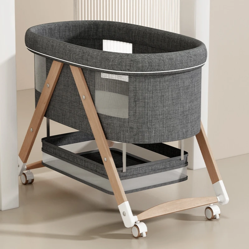 Cuna plegable con altura ajustable y ruedas para desplazarla entre habitaciones