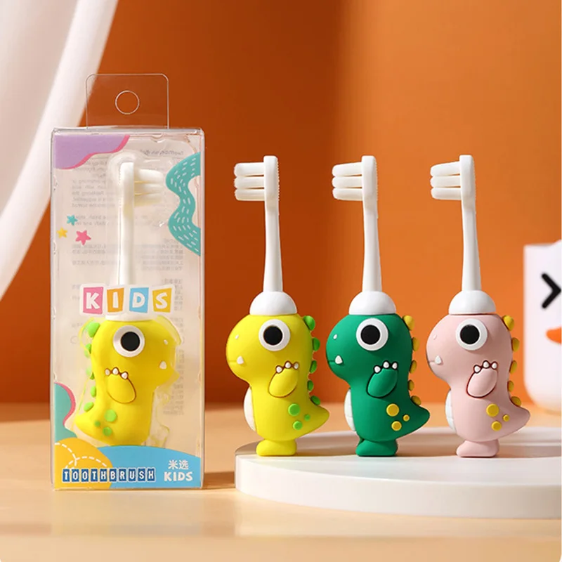 Cepillo de dientes infantil con dinosaurio y cerdas suaves - imagen 2
