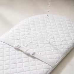 Colchón ovalado para cuna con funda impermeable lavable