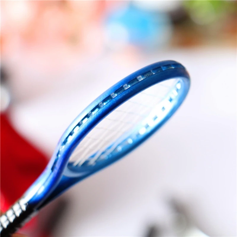 Set de tenis infantil con raqueta y pelota para jugar en casa - imagen 2