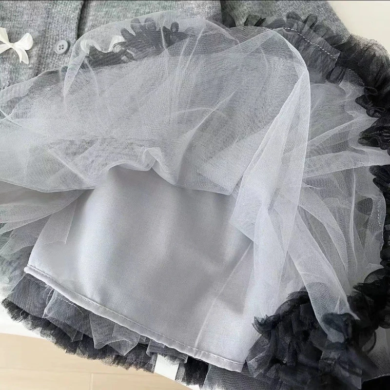 Cardigan y suéter del conjunto infantil