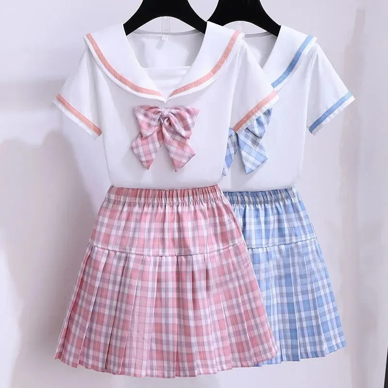 Conjunto niña preppy top de manga corta y falda a cuadros