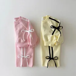Conjunto bebé niña sudadera de rayas con lazo y pantalón elástico