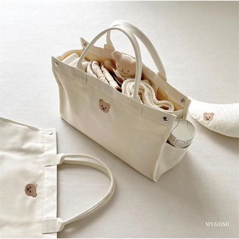 Bolsa pañalera de lona espaciosa con bolsillos para bebé - imagen 4