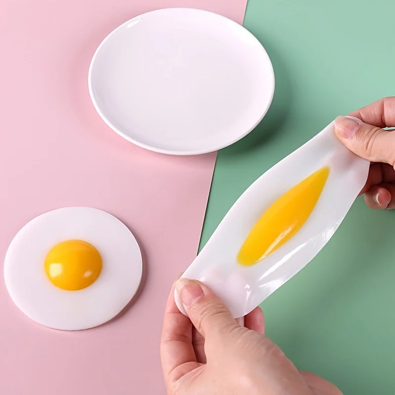 Funky Egg Splat Ball pelota antiestrés huevo estrujable para niños - imagen 3