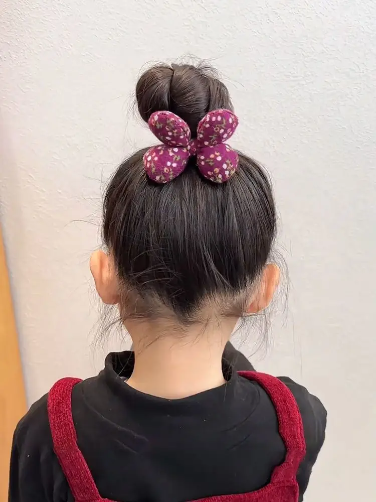 Lazos con flores acolchadas para niña