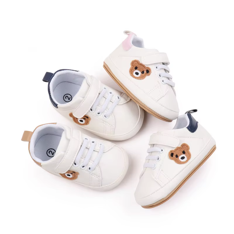 Zapatos de bebé azules de dibujos animados con suela de goma