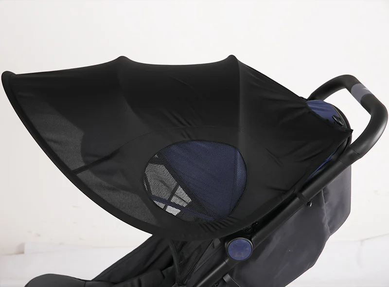 Parasol extensible extendido en cochecito