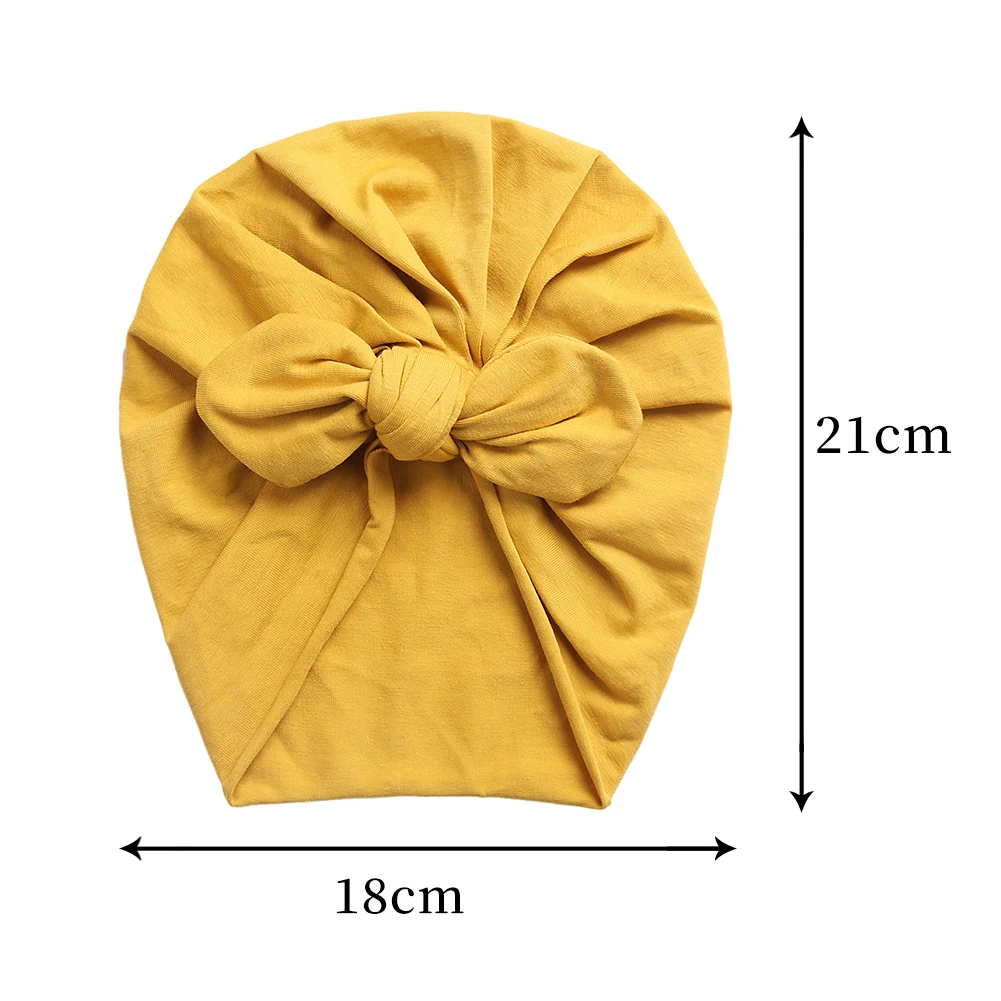 Gorros con lazo de oso bonito en tono caramelo