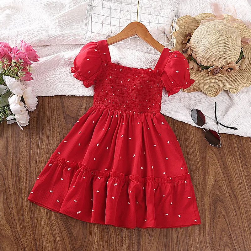 Vestido de lunares rosa con falda de pastel para niña