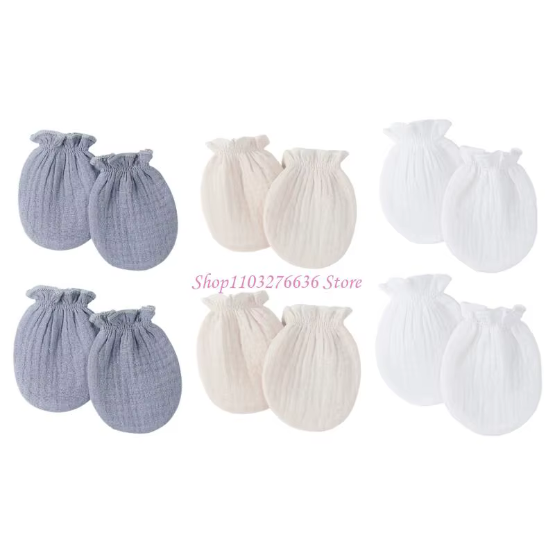 Guantes de algodón para bebé en tono blanco