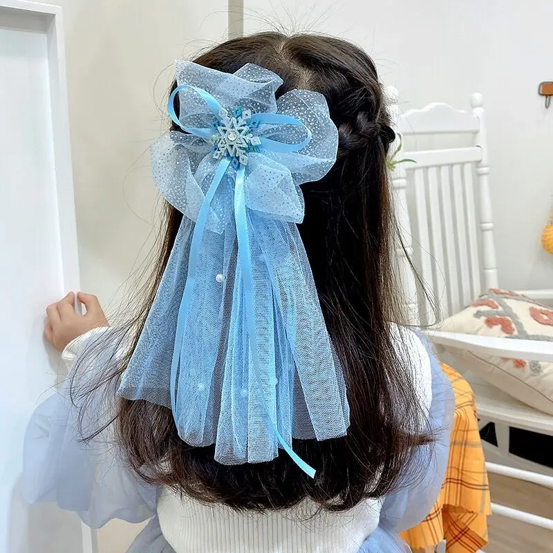Pinzas para el cabello infantiles con copo de nieve brillantes - imagen 2