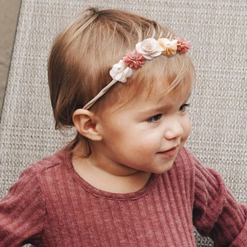 Diadema de nailon suave con flores artificiales