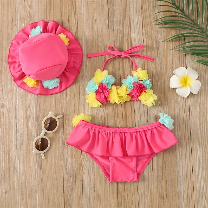 Traje de baño niña con flores, bikini halter y gorro de playa - imagen 4
