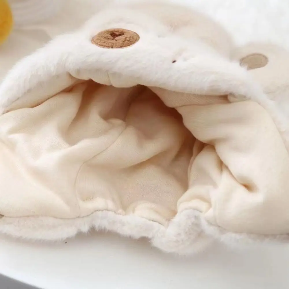 Gorro calentito con pompón para niños – Protección de oídos en invierno - imagen 3