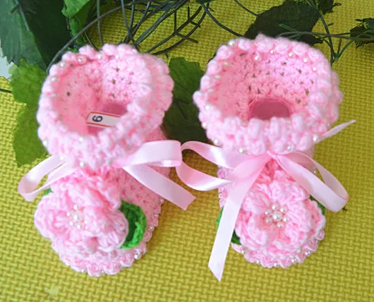 Zapatos de bebé con flor y cordones para ajustar