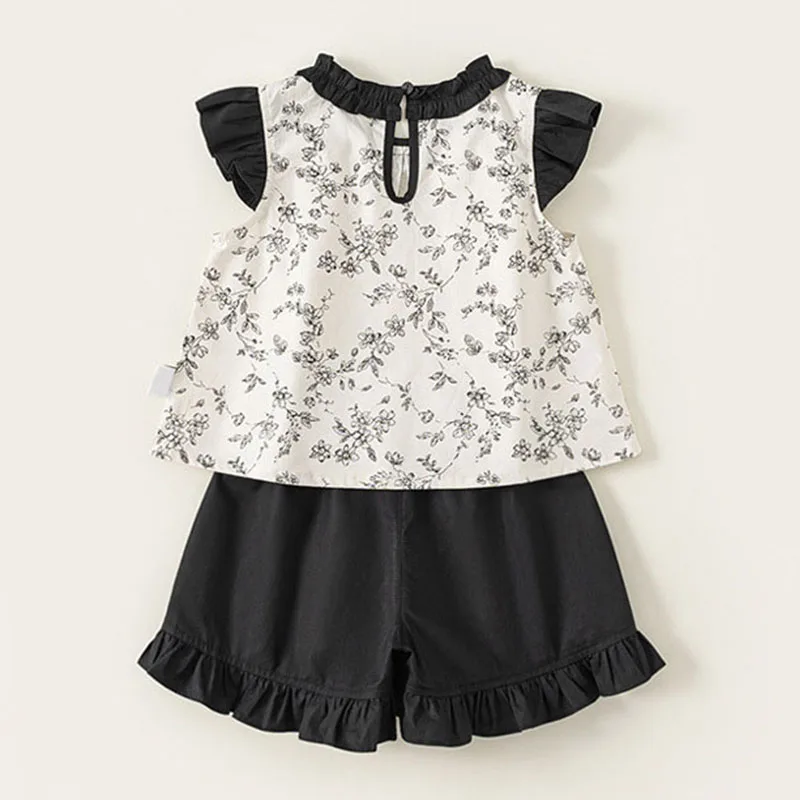 Conjunto verano niña: top sin mangas floral y pantalón corto negro - imagen 2