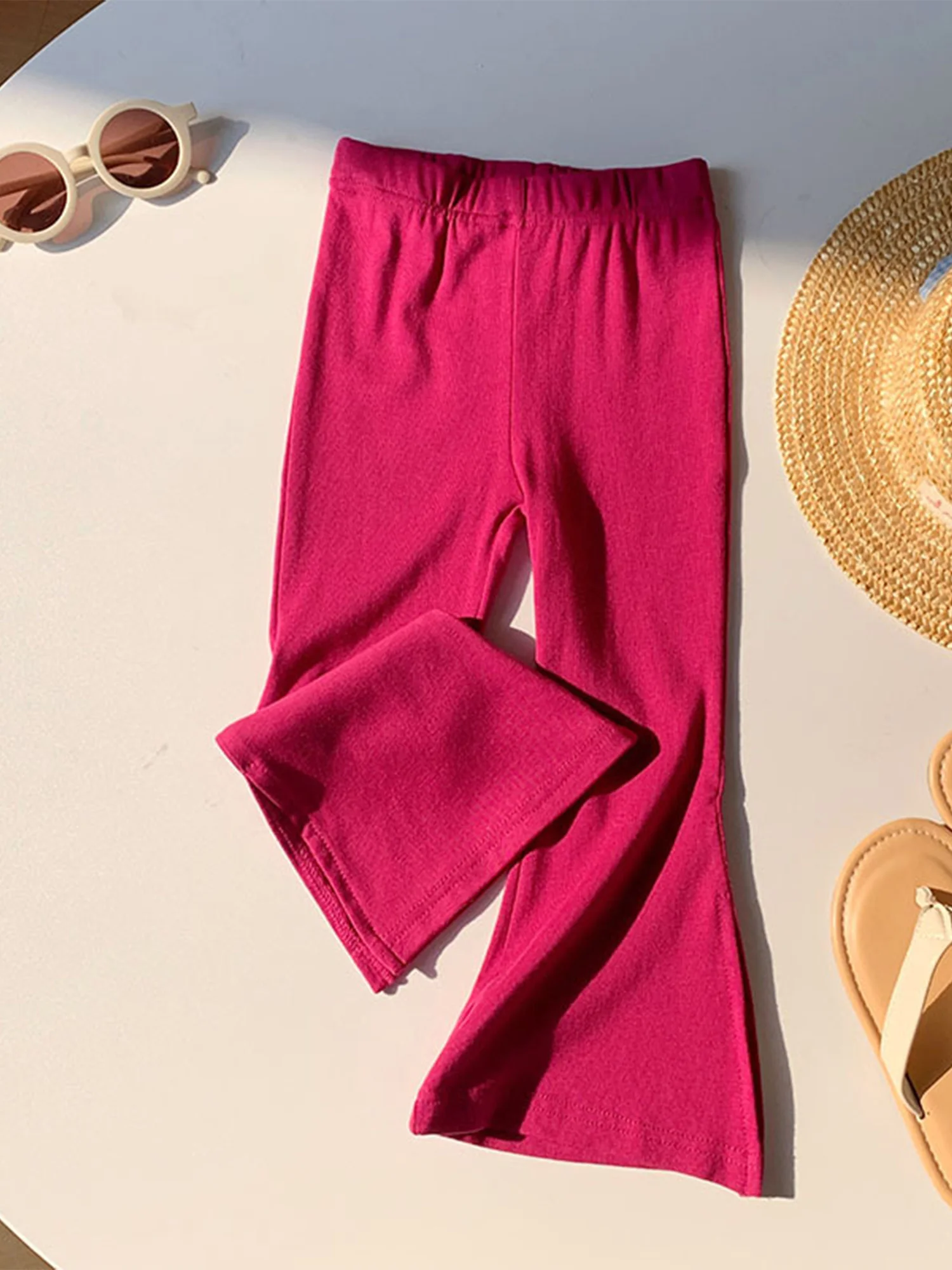 Pantalones acampanados de niña pequeña con cintura elástica