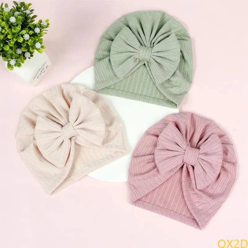 Gorro puesto en bebé, vista frontal