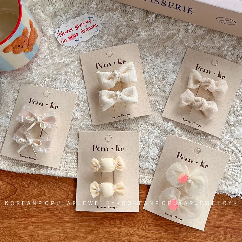 Pinzas para el pelo bebé con lazo de encaje y perlas - imagen 4