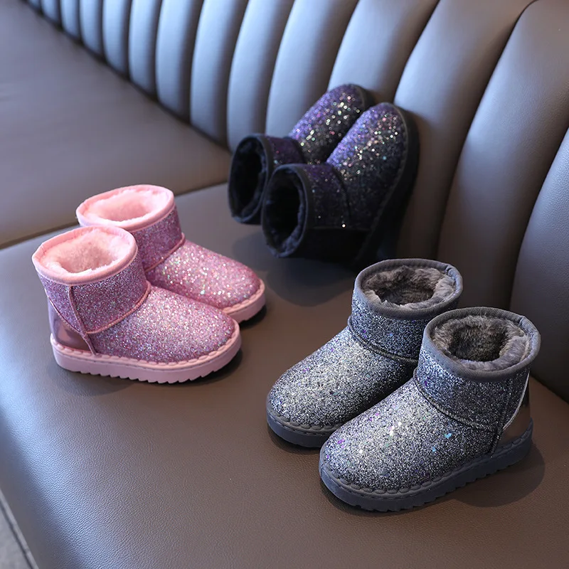 Botas de invierno con lentejuelas en color rosa brillante