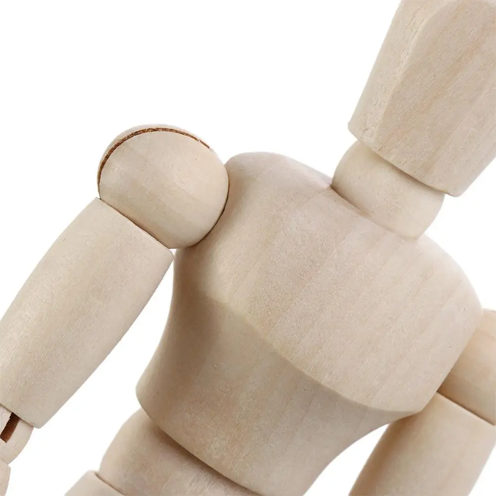 Figura de acción de madera con piezas metálicas