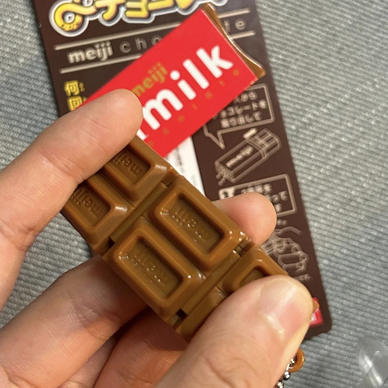 Juguete antiestrés chocolate Meiji flexible con sonido al estirar - imagen 4