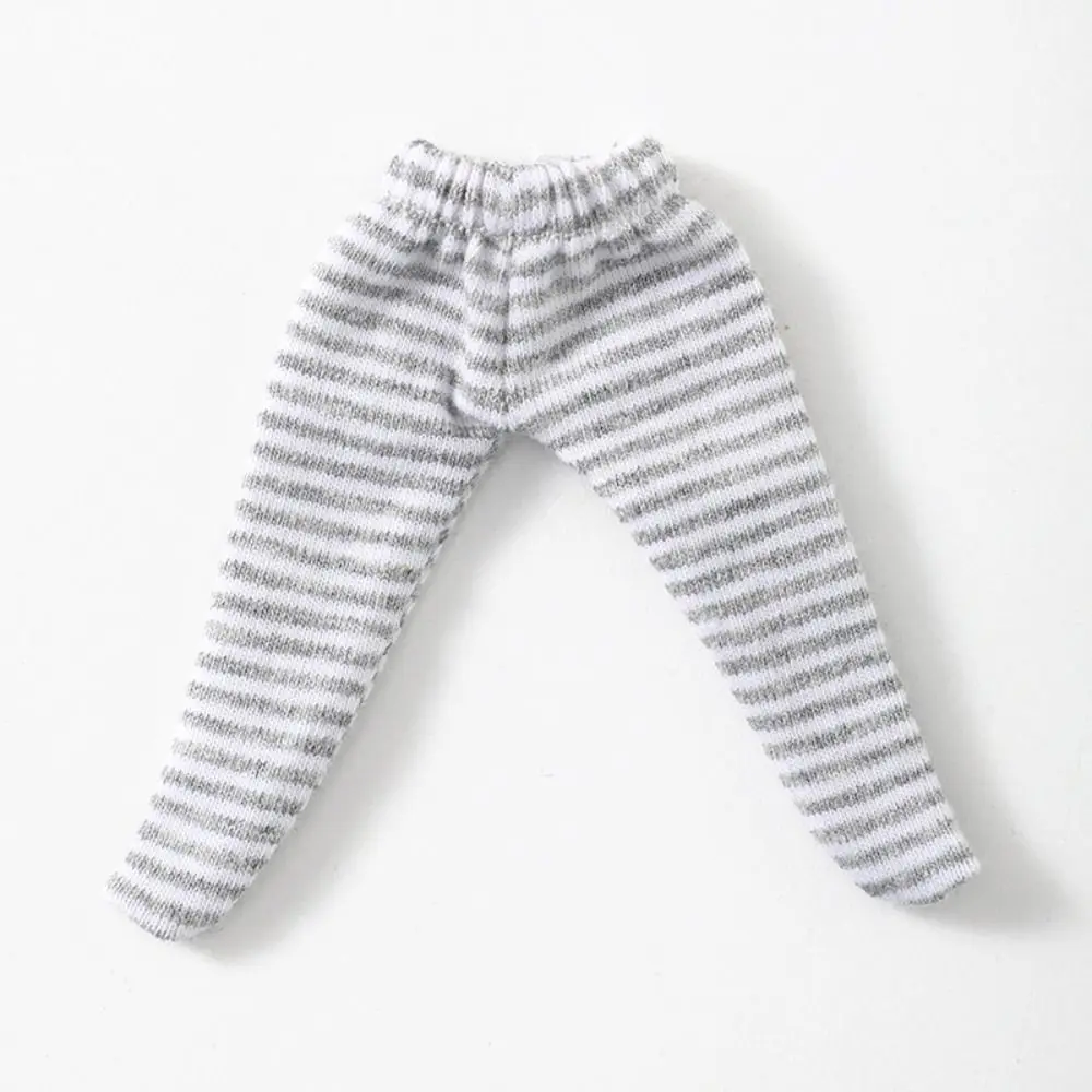 Pantalón malla color beige para muñeca Obitsu 11